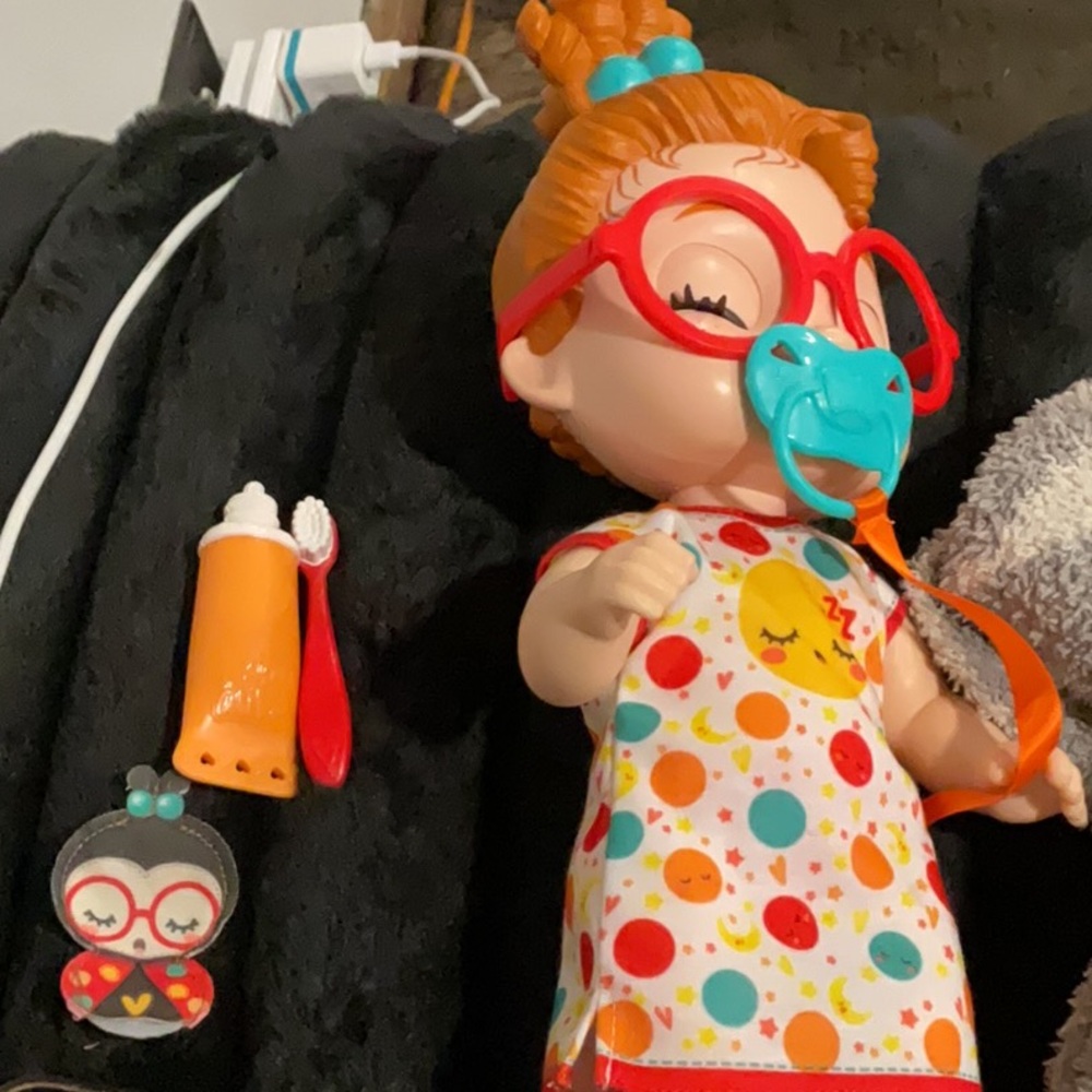 Red and Orange Doll with Accessories
